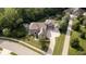 Stunning aerial view showcases this home with a beautifully landscaped yard and elegant architectural design at 1060 Cape Coral Dr, Cicero, IN 46034