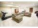 Spacious basement featuring a large sectional sofa and treadmill at 1060 Cape Coral Dr, Cicero, IN 46034