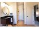 Neutral-colored bathroom featuring granite-topped vanity, walk-in shower, and separate water closet at 1060 Cape Coral Dr, Cicero, IN 46034
