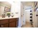 Well-lit bathroom with double vanity, modern fixtures, and shower/tub combo at 1060 Cape Coral Dr, Cicero, IN 46034