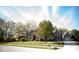 Charming two-story home with a well-manicured front yard and a classic brick facade at 1060 Cape Coral Dr, Cicero, IN 46034