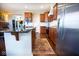 Well-equipped kitchen features a large center island, stainless steel appliances, granite countertops, and ample cabinet space at 1060 Cape Coral Dr, Cicero, IN 46034
