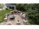 Aerial view of an outdoor patio featuring a fireplace and lounge area at 1060 Cape Coral Dr, Cicero, IN 46034