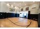 Fantastic recreation room with basketball court and an adjacent lounge area perfect for entertainment at 1060 Cape Coral Dr, Cicero, IN 46034