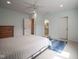 Spacious bedroom with ensuite bathroom access, neutral carpet, and ample natural light at 10628 Walnut Creek W Dr, Carmel, IN 46032