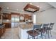 Gourmet kitchen showcasing a center island with granite countertop and custom cabinetry at 10628 Walnut Creek W Dr, Carmel, IN 46032