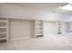 Large walk-in closet with carpeted floors, a window and built in shelving and rods at 10628 Walnut Creek W Dr, Carmel, IN 46032