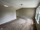 Spacious living room with ample natural light, creating a welcoming and comfortable environment at 11106 Wismar Dr, Indianapolis, IN 46235