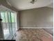 Spacious living room with sliding glass doors to the deck at 11106 Wismar Dr, Indianapolis, IN 46235