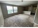 Bright living room with large windows, providing plenty of natural light and a cozy atmosphere at 11106 Wismar Dr, Indianapolis, IN 46235