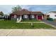 Charming single-story home with a well-maintained lawn and a driveway at 1150 Younce St, Franklin, IN 46131