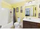 Clean bathroom with a combination shower and tub and a spacious sink at 11840 Geyser Ct, Fishers, IN 46038