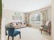 Cozy living room with neutral tones, bright natural light, and charming decor accents at 11840 Geyser Ct, Fishers, IN 46038