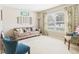 Bright living room featuring a comfortable sofa, and neutral decor at 11840 Geyser Ct, Fishers, IN 46038