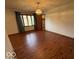 Bedroom with hardwood floors, natural light, and a spacious closet at 1215 Willow Springs Blvd, Brownsburg, IN 46112