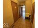 This functional laundry area also features a utility sink and access to a hallway at 1215 Willow Springs Blvd, Brownsburg, IN 46112