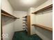 Well-organized walk-in closet features shelving on all sides, offering ample storage at 1215 Willow Springs Blvd, Brownsburg, IN 46112