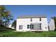 Spacious backyard with lush green grass and a trampoline, perfect for outdoor activities at 12561 Gladecrest Dr, Carmel, IN 46033