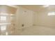Spacious basement with tile flooring, neutral walls, and a window for natural light at 12561 Gladecrest Dr, Carmel, IN 46033