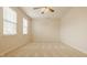 Bedroom with ceiling fan, carpet and natural light from the windows at 12561 Gladecrest Dr, Carmel, IN 46033