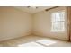 Bedroom featuring carpet, a window with curtains, and a ceiling fan at 12561 Gladecrest Dr, Carmel, IN 46033