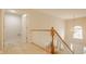 Bright hallway with neutral walls, plush carpet, and elegant chandelier at 12561 Gladecrest Dr, Carmel, IN 46033