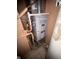 Close-up of a home's furnace, illustrating its features and utility connections for efficient heating at 129 S Boehning St, Indianapolis, IN 46219