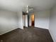 Spacious bedroom with neutral walls, a ceiling fan, and access to an ensuite bath and walk-in closet at 1302 Lexington Trl, Greenfield, IN 46140