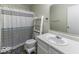 Clean bathroom featuring a shower with a decorative curtain, and a functional vanity at 1328 Osprey Way, Greenwood, IN 46143