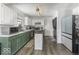 Bright kitchen featuring ample counter space, updated appliances, and a stylish center island at 1328 Osprey Way, Greenwood, IN 46143