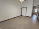 An empty room with tile flooring and a closet, awaits your personal touch to transform the space at 1330 Country Creek Cir, Shelbyville, IN 46176