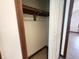 A closet with built-in shelves, enhanced by wood trim, providing efficient storage at 1330 Country Creek Cir, Shelbyville, IN 46176