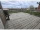 View of a wood deck overlooking a spacious yard at 1330 Country Creek Cir, Shelbyville, IN 46176