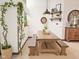 Bright dining room featuring a modern light fixture, shelves, and live plants at 1330 Country Creek Cir, Shelbyville, IN 46176