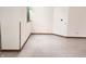 Corner of an empty room featuring tile floor, neutral walls, and baseboard trim at 1330 Country Creek Cir, Shelbyville, IN 46176