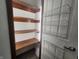 Spacious pantry with shelving and ample storage space at 1330 Country Creek Cir, Shelbyville, IN 46176