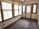 Bright sun room featuring tile flooring, neutral walls, and large windows offering ample natural light at 1330 Country Creek Cir, Shelbyville, IN 46176