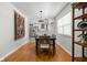 Bright dining area with hardwood floors and modern lighting at 1355 E 56Th St, Indianapolis, IN 46220