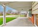 Spacious covered porch offering an outdoor space with a view of the surrounding neighborhood at 1503 Saint John S Ct, Beech Grove, IN 46107