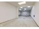 Spacious garage with an overhead door and room for parking and storage at 1503 Saint John S Ct, Beech Grove, IN 46107
