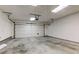 Spacious garage featuring a working overhead garage door and plenty of room for parking and storage at 1503 Saint John S Ct, Beech Grove, IN 46107