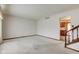 Bright living room with clean walls and neutral carpet, creating a versatile living space at 1503 Saint John S Ct, Beech Grove, IN 46107