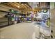Unfinished basement with storage shelves and exposed ceiling at 15150 Mooring E Cir, Carmel, IN 46033