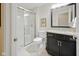 Clean bathroom featuring a glass-enclosed shower and a vanity with a granite countertop at 15150 Mooring E Cir, Carmel, IN 46033