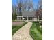 Inviting community gazebo with a charming walkway, benches, and well-maintained landscaping at 15150 Mooring E Cir, Carmel, IN 46033