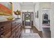 Warm, inviting foyer with hardwood floors and tasteful decor at 15150 Mooring E Cir, Carmel, IN 46033