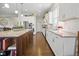 Bright kitchen with a center island, stainless steel appliances, and white cabinetry at 15150 Mooring E Cir, Carmel, IN 46033