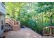 Enjoy the wooded views from this back deck at 1770 Valleywood Dr, Avon, IN 46123