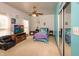 Bright bedroom with ample natural light, complemented by a ceiling fan and mirrored closet doors at 1770 Valleywood Dr, Avon, IN 46123