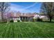 Beautiful single-Gathering home with well-maintained lawn and landscaping, including flowering trees and shrubs at 1770 Valleywood Dr, Avon, IN 46123